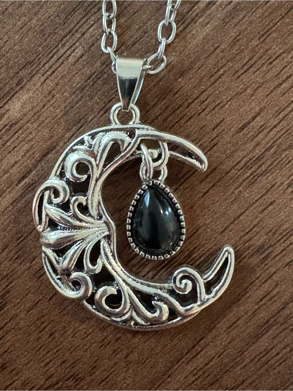 Silver Filigree Crescent Moon Necklace with Black Teardrop